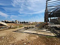 للبيع صالة صناعية ارض شبارق 9.8 دنم حلب كفرناها