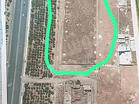 للبيع ارض بحلب جبرين 12 دنم على طريق المطار واجهة 180 متر