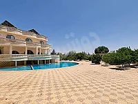 للاجار مزرغة بحلب خان طومان خلف كازية الاهرام 5 دنمات بناء طابقين