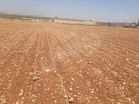 للبيع ارض بحلب حدادين 2 دنم واجهة 22 متر