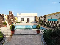 للبيع مزرعة مفروشة 250م غرفة و منافع+مسبح+مشوا/حماه باول الخالدية 
