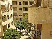 للبيع شقة مقابل بوظة امية جانب كورنيش الجناين حديثة