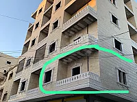 للبيع شقة بلكون اول عضم بناء جديد 170م/الرقة _شارع الكنيسة 