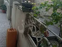 للبيع شقة طابق أرضي بناء قديم 125م/الحسكة _النشوة الليلية